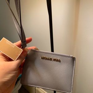 NWT Michael Kors coin purse/wristlet.